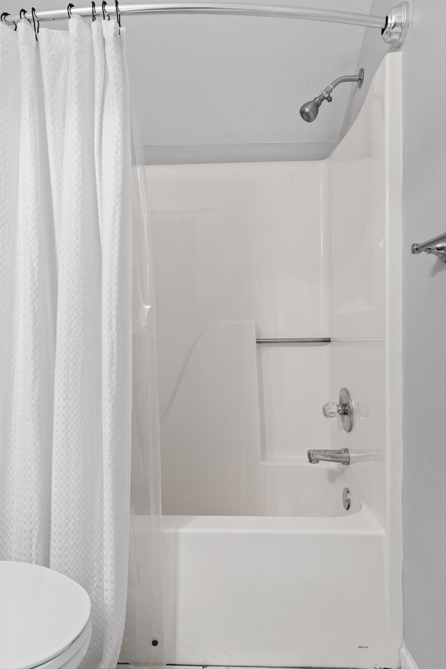 6837 Benwood Dr, Ooltewah, TN 37363 - bathroom with shower / bath combo with shower curtain and toilet