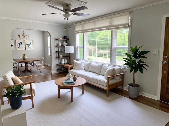 1641 John Ross Rd, Chattanooga, TN 37412 - living area featuring wood finished floors, a ceiling fan, baseboards, and arched walkways