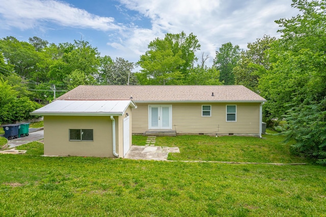 1641 John Ross Rd, Chattanooga, TN 37412 - back of property with french doors, a yard, and a patio
