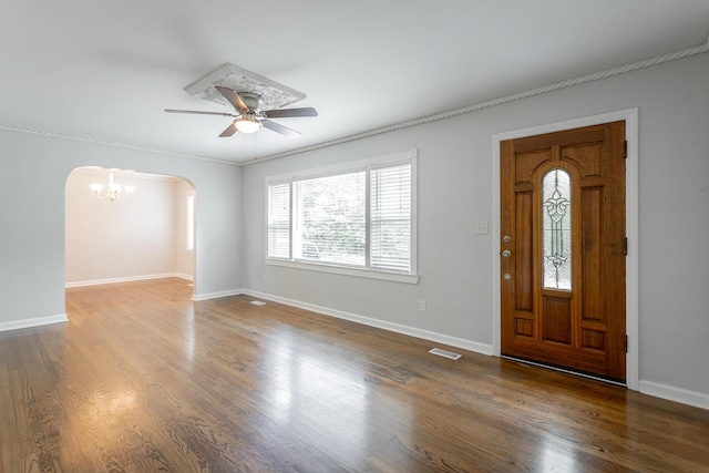 1641 John Ross Rd, Chattanooga, TN 37412 - foyer featuring arched walkways, a chandelier, a ceiling fan, baseboards, and wood finished floors