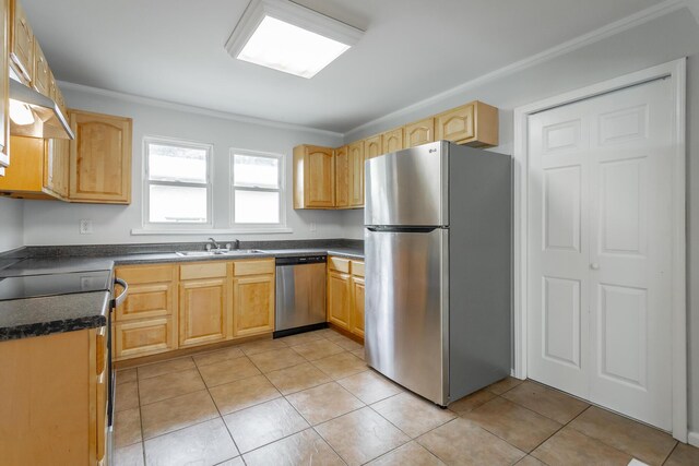 1641 John Ross Rd, Chattanooga, TN 37412 - kitchen with appliances with stainless steel finishes, dark countertops, under cabinet range hood, ornamental molding, and light brown cabinetry