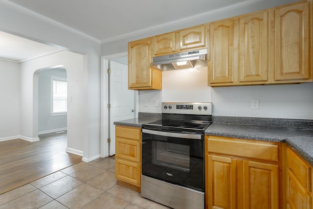 1641 John Ross Rd, Chattanooga, TN 37412 - kitchen with under cabinet range hood, stainless steel electric range, arched walkways, dark countertops, and crown molding