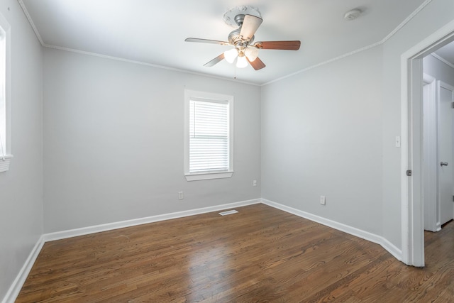 1641 John Ross Rd, Chattanooga, TN 37412 - spare room featuring dark wood-style flooring, ceiling fan, baseboards, ornamental molding, and a smoke detector