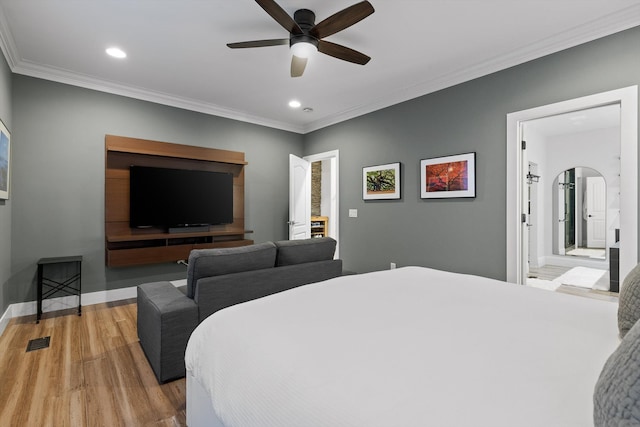 bedroom featuring wood finished floors, recessed lighting, crown molding, baseboards, and ceiling fan