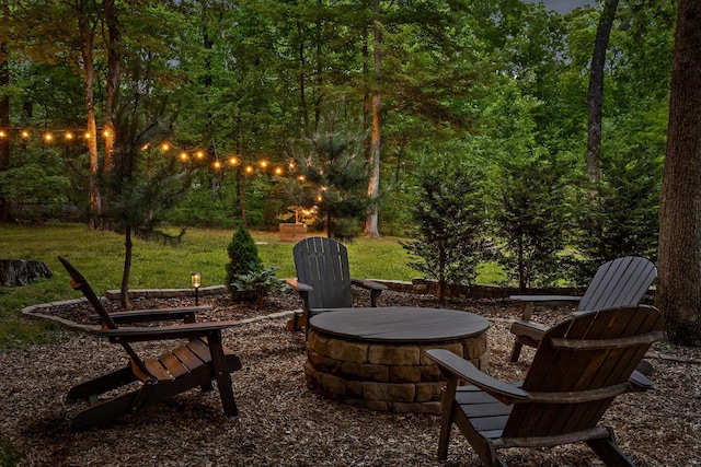view of patio / terrace featuring a fire pit