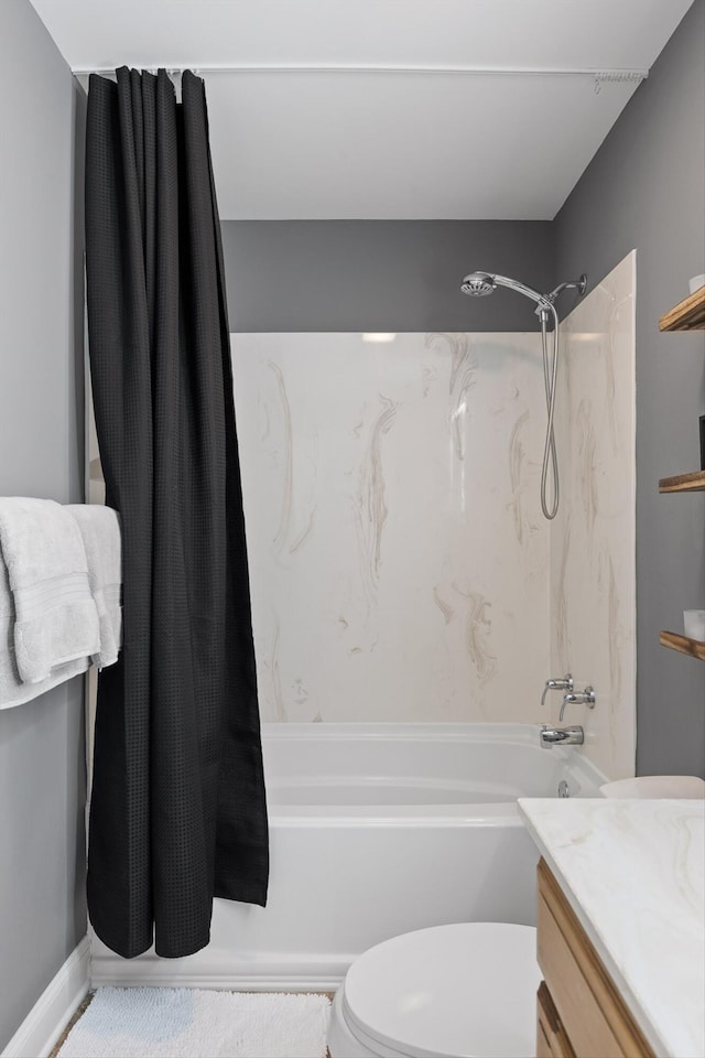 bathroom featuring shower / tub combo with curtain, toilet, and vanity