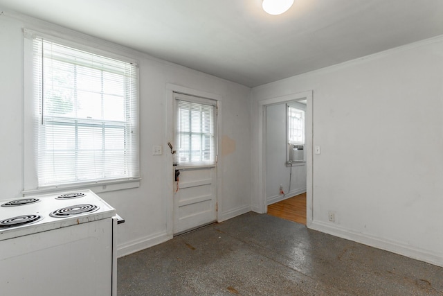 doorway to outside featuring ornamental molding, baseboards, and cooling unit