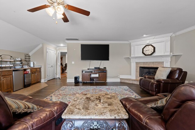 8109 Propeller Dr, Ooltewah, TN 37363 - living room with ceiling fan, crown molding, baseboards, a fireplace, and wood finished floors