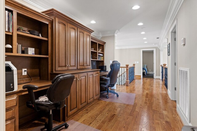 8109 Propeller Dr, Ooltewah, TN 37363 - office space with light wood-style flooring, ornamental molding, recessed lighting, built in desk, and baseboards