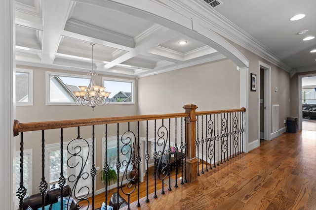 8109 Propeller Dr, Ooltewah, TN 37363 - hall featuring recessed lighting, wood finished floors, beamed ceiling, ornamental molding, and arched walkways