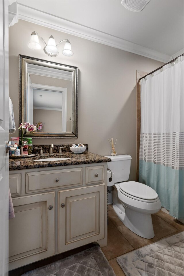 8109 Propeller Dr, Ooltewah, TN 37363 - full bathroom with crown molding, toilet, tile patterned floors, vanity, and a shower with shower curtain