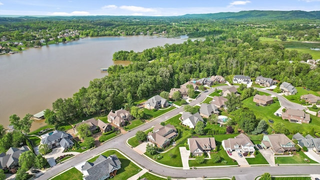 8109 Propeller Dr, Ooltewah, TN 37363 - aerial overview of property's location with a heavily wooded area, nearby suburban area, and a nearby body of water