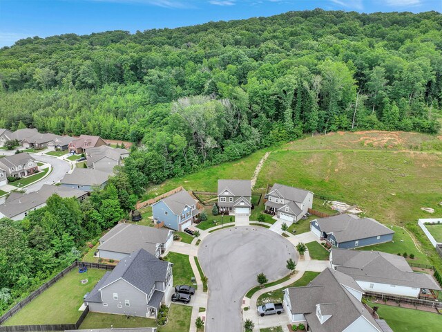 5479 Amber Grove Way, Hixson, TN 37343 - aerial overview of property's location featuring nearby suburban area and a heavily wooded area