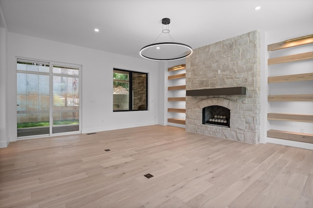 1608 Knickerbocker Ave, Chattanooga, TN 37405 - unfurnished living room with wood finished floors, baseboards, recessed lighting, a fireplace, and built in features