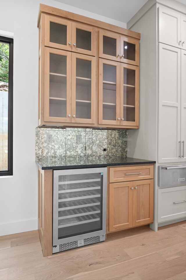 1608 Knickerbocker Ave, Chattanooga, TN 37405 - bar featuring beverage cooler, a warming drawer, decorative backsplash, light wood finished floors, and baseboards