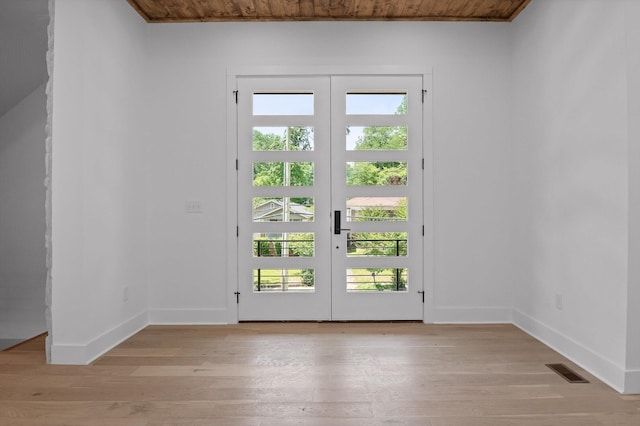 1608 Knickerbocker Ave, Chattanooga, TN 37405 - entryway with french doors, healthy amount of natural light, baseboards, light wood finished floors, and wooden ceiling