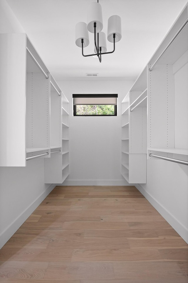 1608 Knickerbocker Ave, Chattanooga, TN 37405 - spacious closet with a chandelier and light wood finished floors