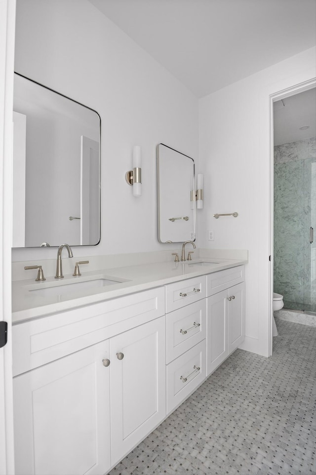 1608 Knickerbocker Ave, Chattanooga, TN 37405 - bathroom with a stall shower, double vanity, toilet, and tile patterned floors