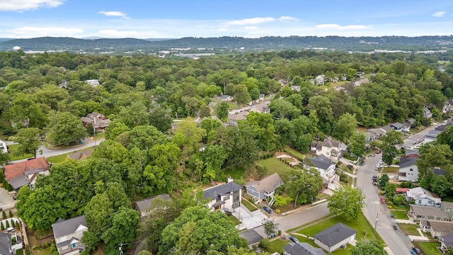 1608 Knickerbocker Ave, Chattanooga, TN 37405 - aerial view of property and surrounding area with a mountainous background, nearby suburban area, and a heavily wooded area