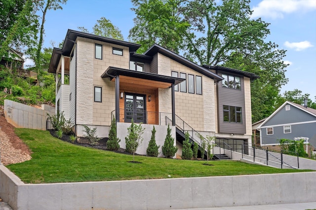 1608 Knickerbocker Ave, Chattanooga, TN 37405 - contemporary home with an attached garage, concrete driveway, and stone siding