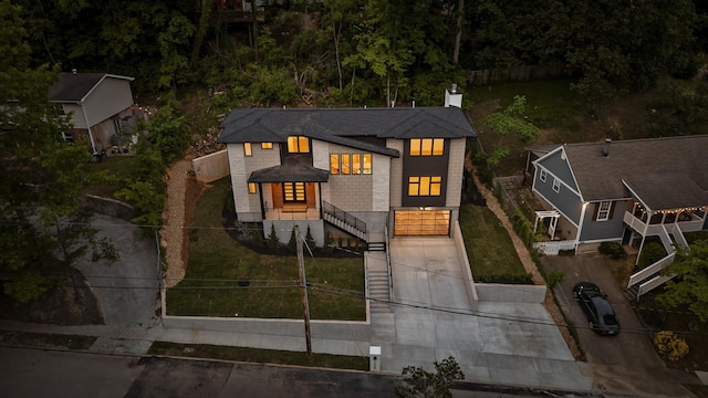 1608 Knickerbocker Ave, Chattanooga, TN 37405 - view of front of house featuring driveway, a chimney, and stairway