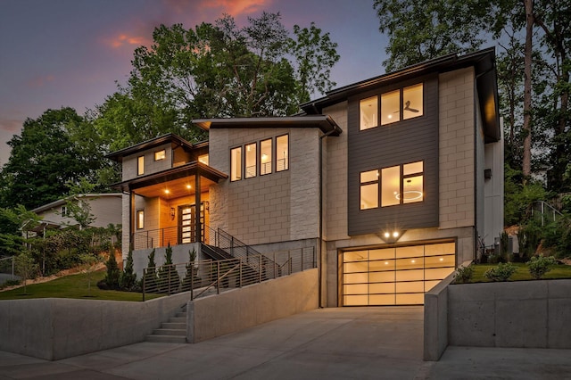 1608 Knickerbocker Ave, Chattanooga, TN 37405 - modern home with driveway, a garage, and stairs