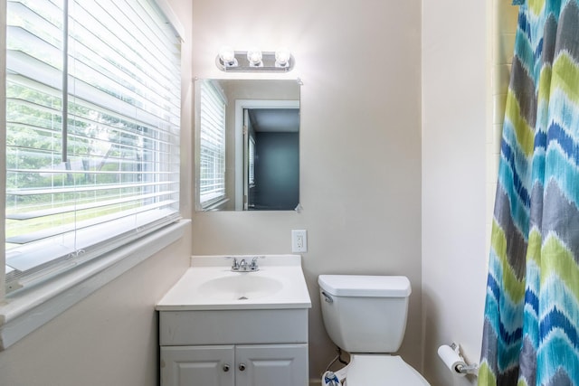 2524 Lyons Ln, Soddy Daisy, TN 37379 - bathroom featuring vanity, toilet, and a shower with curtain