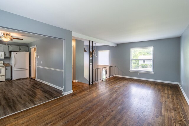 2524 Lyons Ln, Soddy Daisy, TN 37379 - unfurnished room with dark wood-type flooring, baseboards, and ceiling fan