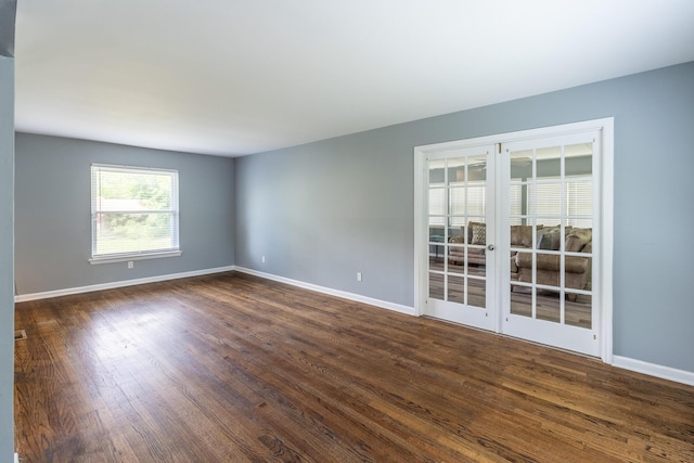 2524 Lyons Ln, Soddy Daisy, TN 37379 - spare room with dark wood-style flooring, baseboards, and french doors