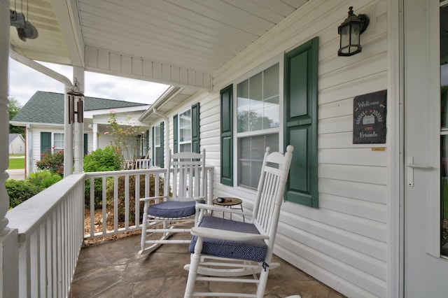 balcony featuring a porch