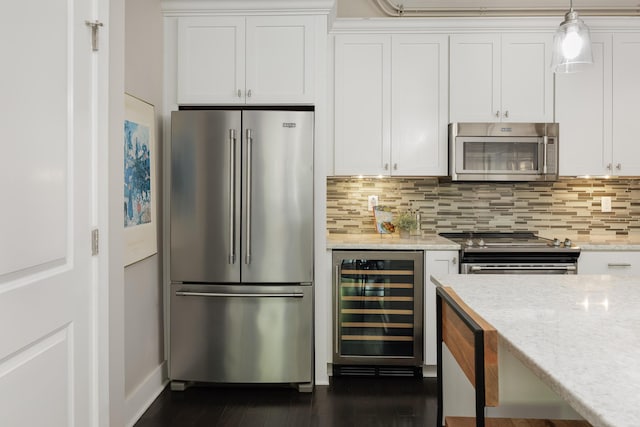 1301 Market St Unit 103, Chattanooga, TN 37402 - kitchen with stainless steel appliances, wine cooler, and white cabinets