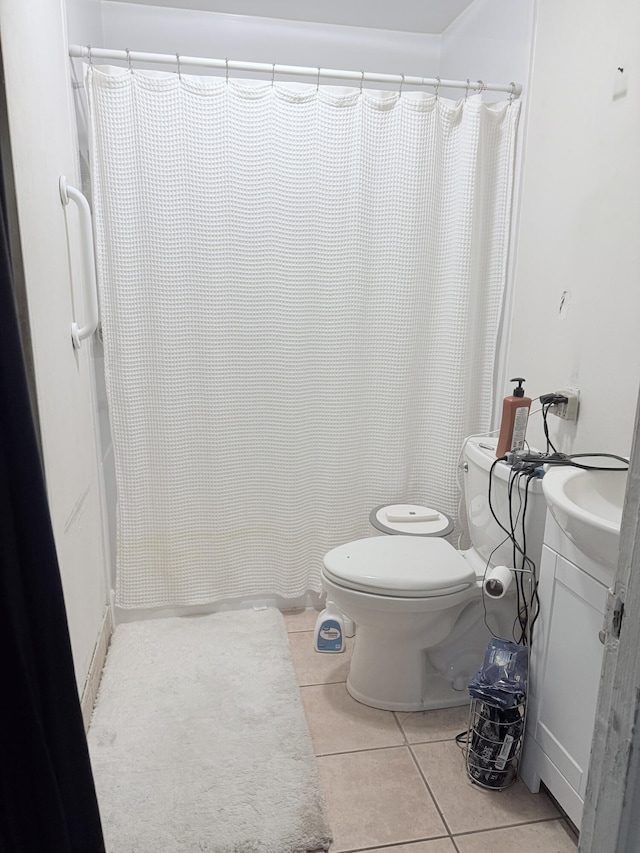 5518 Miller Dr, Chattanooga, TN 37411 - bathroom with tile patterned flooring, toilet, vanity, and a shower with shower curtain