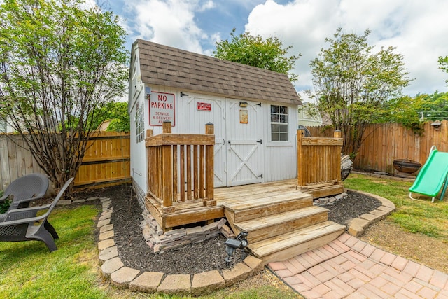 view of shed featuring a fenced backyard