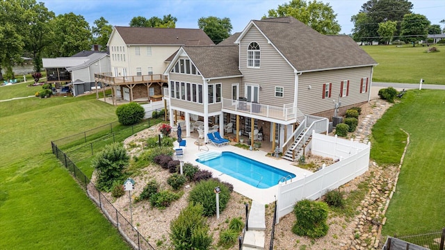 362 Windmill Ln, Georgetown, TN 37336 - back of house featuring a shingled roof, a wooden deck, stairway, and a patio area