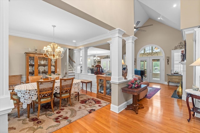 362 Windmill Ln, Georgetown, TN 37336 - dining area with a chandelier, ornate columns, light wood finished floors, stairs, and crown molding