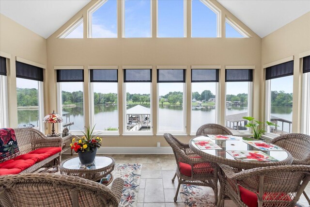 362 Windmill Ln, Georgetown, TN 37336 - sunroom featuring a water view, high vaulted ceiling, tile patterned flooring, and baseboards