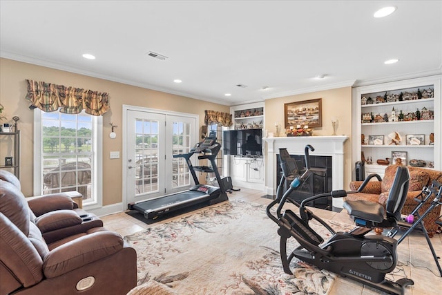 362 Windmill Ln, Georgetown, TN 37336 - exercise area with tile patterned floors, ornamental molding, recessed lighting, a fireplace with flush hearth, and built in features