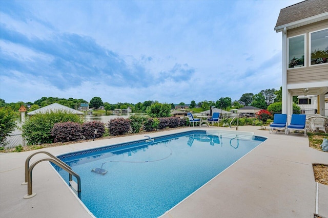362 Windmill Ln, Georgetown, TN 37336 - view of swimming pool with a patio area, view of wooded area, and a water view