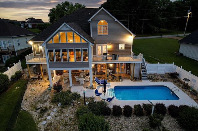 362 Windmill Ln, Georgetown, TN 37336 - rear view of property featuring stairway, a patio area, and a shingled roof