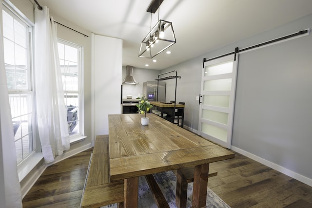 5611 Caney Ridge Cir, Ooltewah, TN 37363 - dining area with a barn door, dark wood-style flooring, recessed lighting, and baseboards