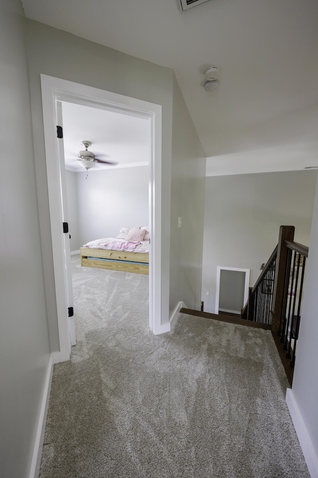 5611 Caney Ridge Cir, Ooltewah, TN 37363 - hallway featuring carpet, an upstairs landing, and baseboards