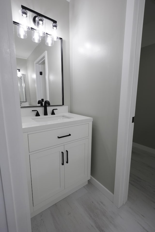 5611 Caney Ridge Cir, Ooltewah, TN 37363 - bathroom with vanity and baseboards