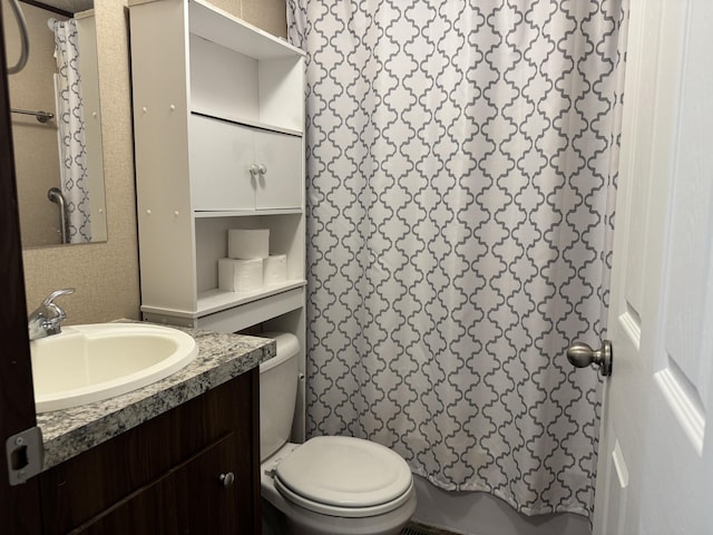 312 Brandon Cir # 27, Chatsworth, GA 30705 - bathroom with vanity, toilet, and a shower with curtain
