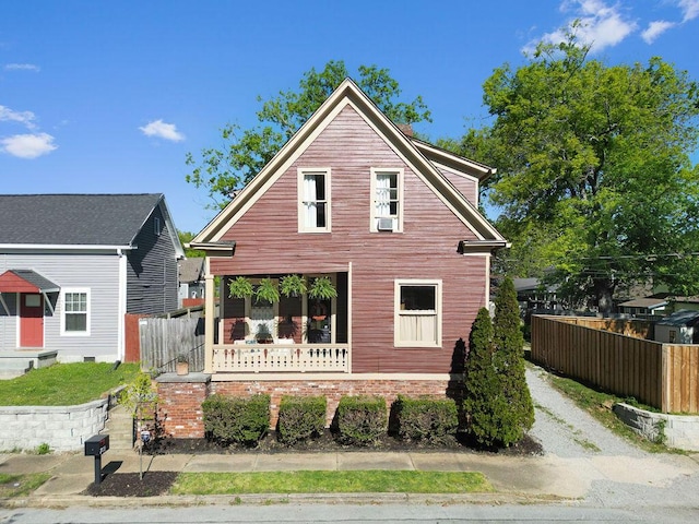 709 S Holly St, Chattanooga, TN 37404 - view of front of property with fence and a porch