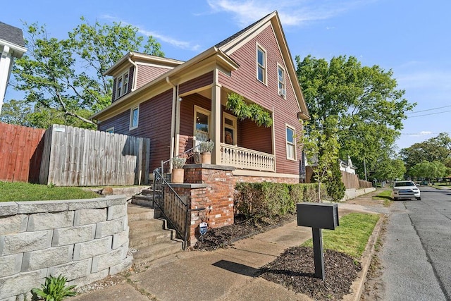 709 S Holly St, Chattanooga, TN 37404 - view of front facade with covered porch, stairs, and fence