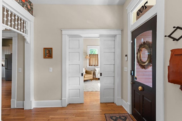 709 S Holly St, Chattanooga, TN 37404 - foyer with light wood-type flooring and baseboards
