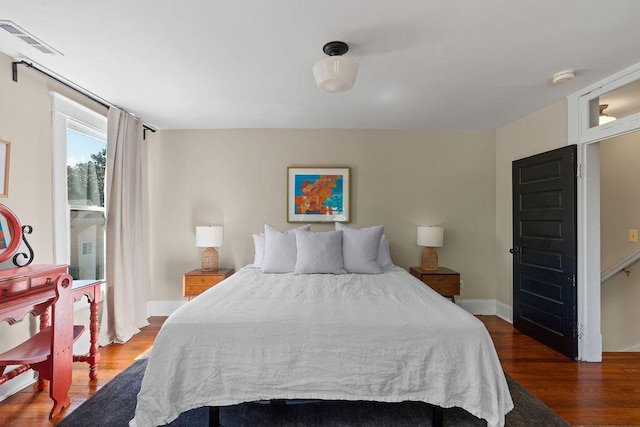 709 S Holly St, Chattanooga, TN 37404 - bedroom with wood finished floors and baseboards