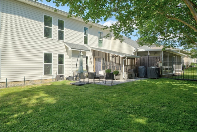 7830 Legacy Park Ct, Chattanooga, TN 37421 - rear view of house featuring a sunroom and a patio