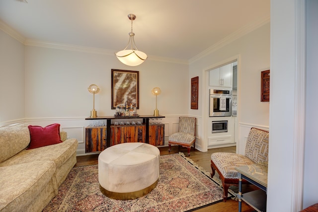 7830 Legacy Park Ct, Chattanooga, TN 37421 - living room featuring ornamental molding, wood finished floors, wainscoting, and a dry bar
