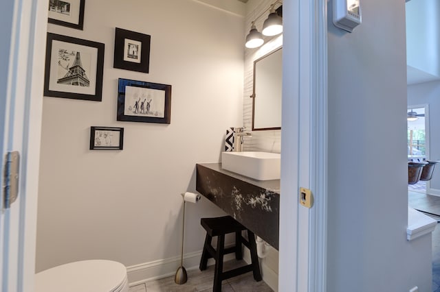 7830 Legacy Park Ct, Chattanooga, TN 37421 - half bath featuring toilet, vanity, and baseboards